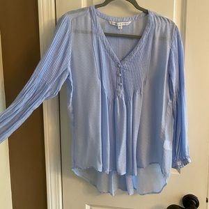 Blouse with pleats